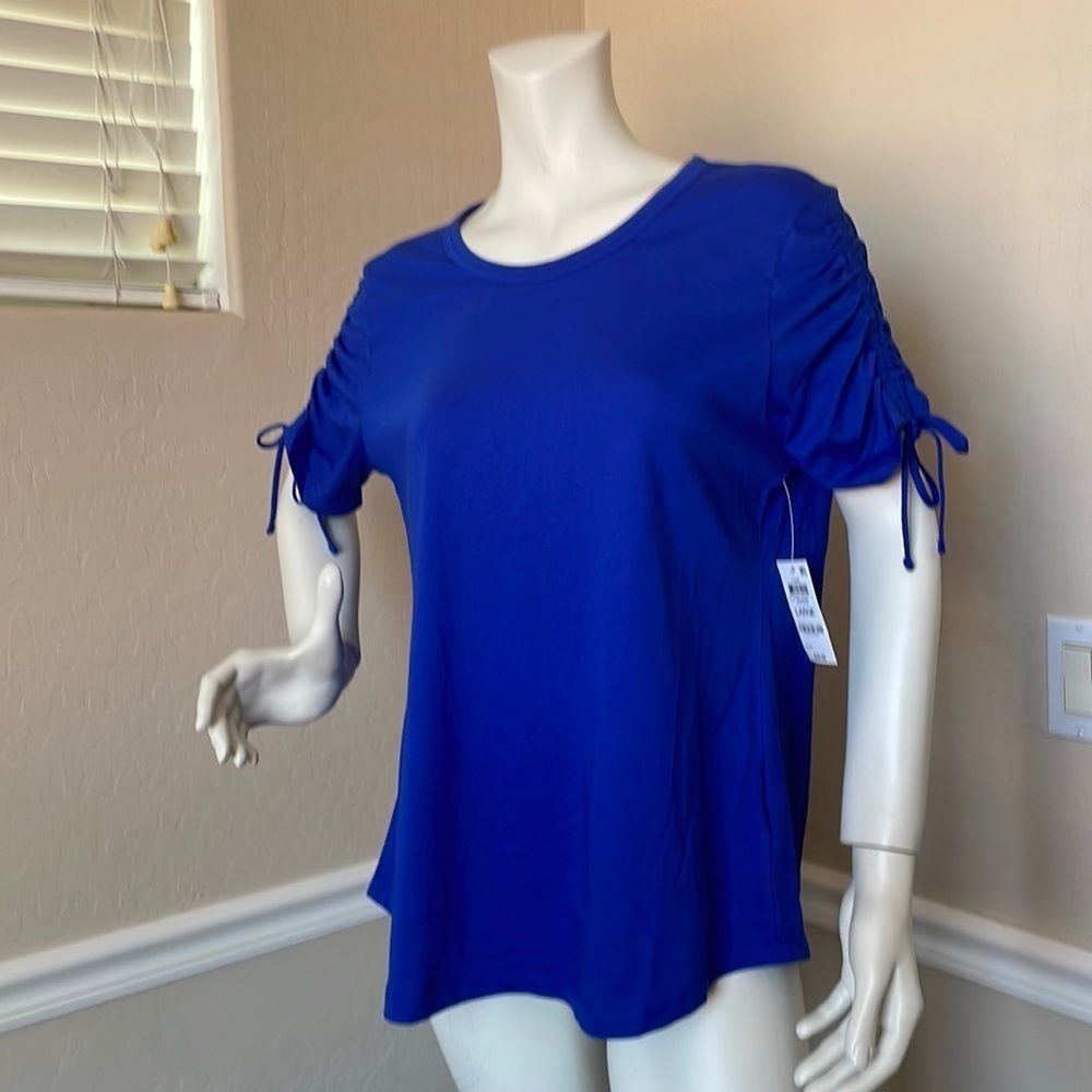 - Woman’s Karen Scott shirt